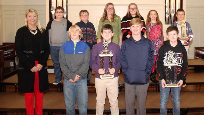 Students receive awards during the annual Academic League ceremony.