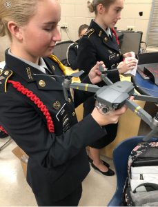 JROTC cadet working with a drone.