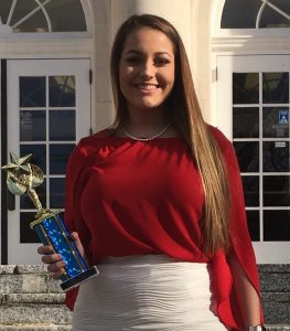 Ryleigh Swafford, Human Resources Management, 2nd place is shown holding her trophy.