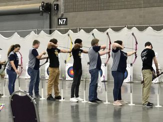 Ready, aim, the Knox Central archers are shown getting ready to shoot at the state tournament.