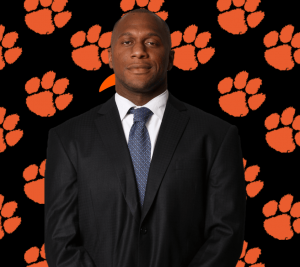 Rodney Clarke is shown in front of a LC cat paw background