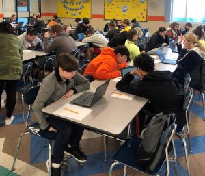 The CERT assessment was administered to students in the cafeteria at Lynn Camp. Shown are students with their computers taking the timed assessments.