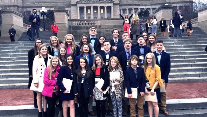 KCMS students pose in front of the Capitol during their visit to KYA.