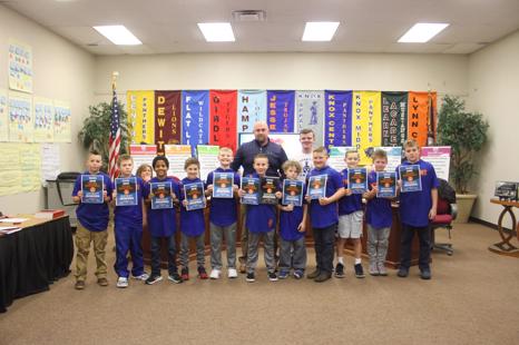 Lay Elementary B team line up for a photo with certificates presented by the Board.
