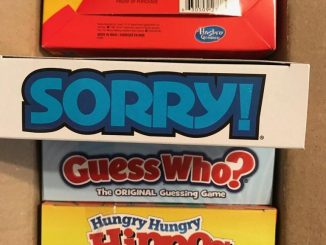 Box of games including Sorry and Guess Who