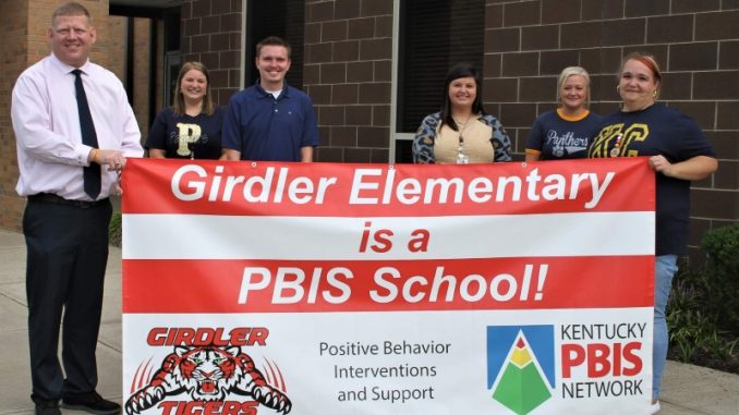 Girdler PBIS team display banner outside of school.