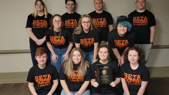 Lynn Camp's Character Performance Team poses with their first place plaque.
