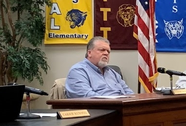 Jim Miles shown during a board meeting