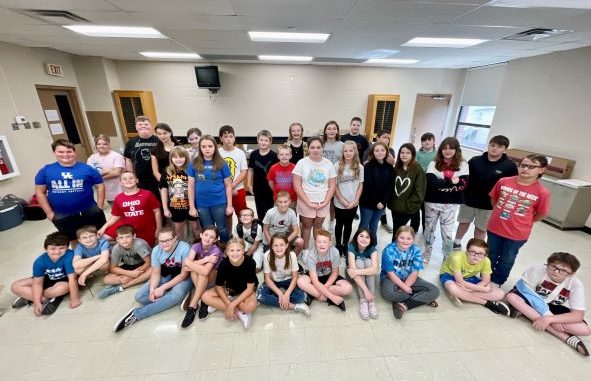 Robotics students gathered for a group photo inside a classroom at KCMS during their First Lego work day.