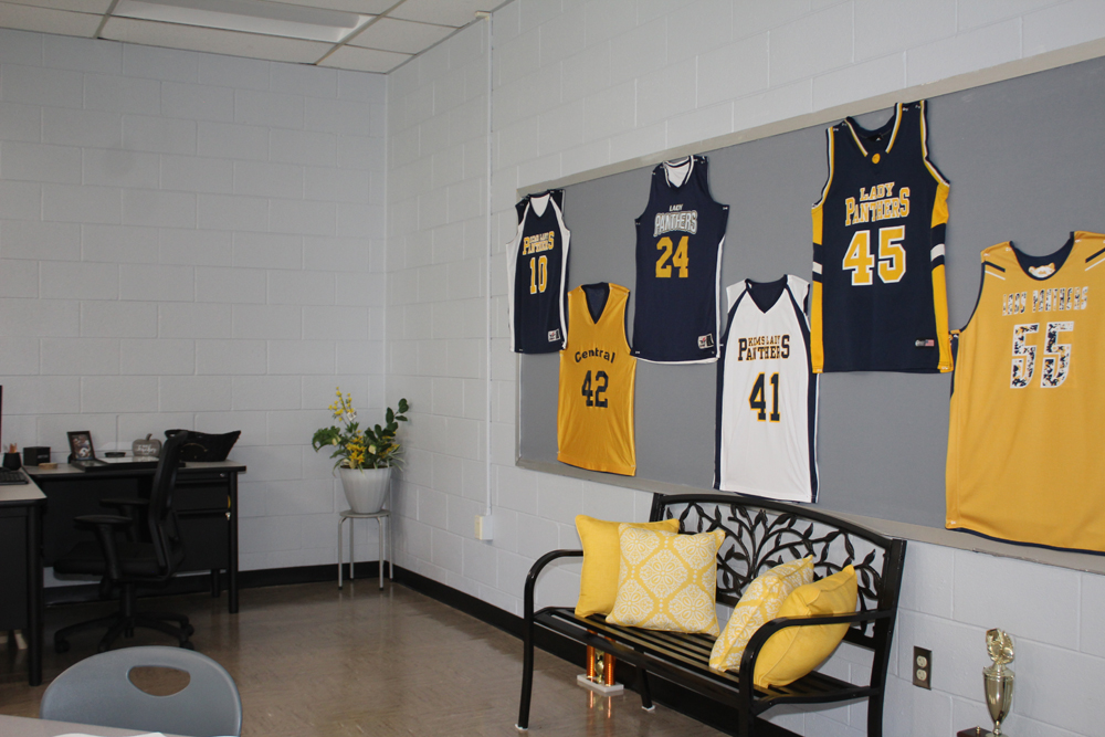 Athletic jerseys displayed inside classroom