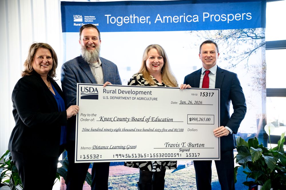 Knox County and USDA administrators are shown with a check for telehealth.